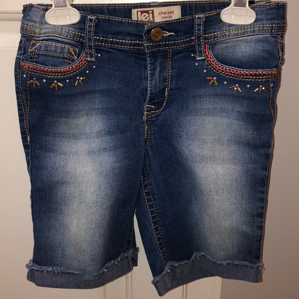 Jeweled blue jean cut off shorts